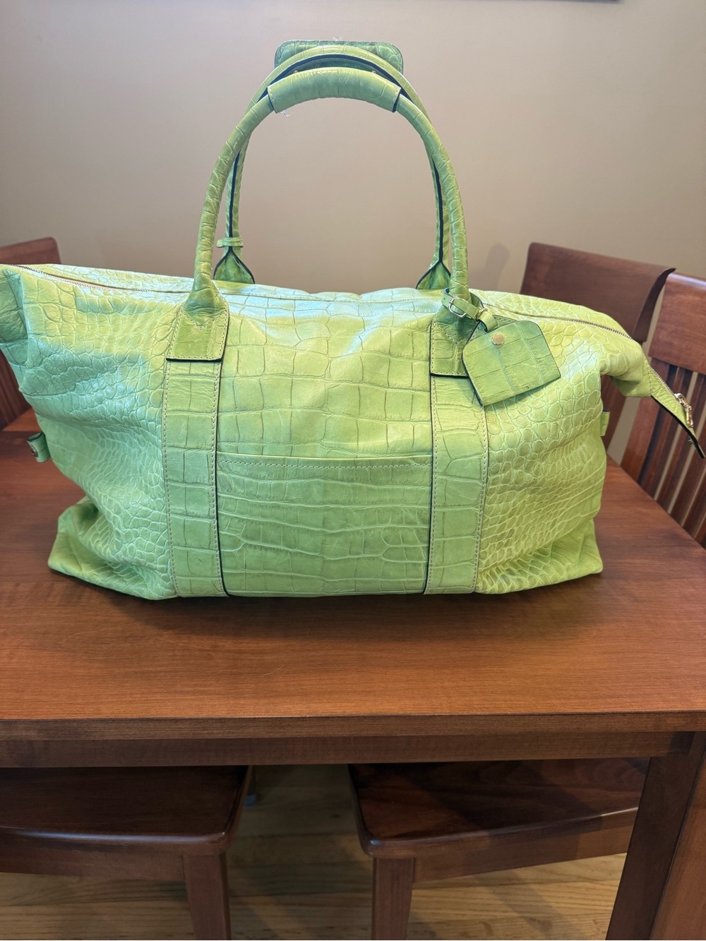Dooney & Bourke Nile Medium Duffle in a bright lime or avocado crocodile-embosse